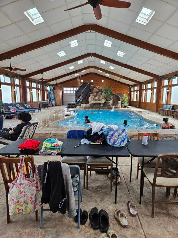 Families gathered around the indoor pool